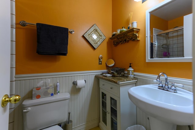 bathroom featuring sink and toilet