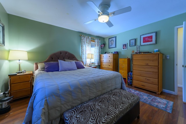 bedroom featuring dark wood-type flooring and ceiling fan