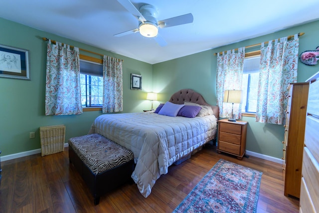 bedroom featuring dark hardwood / wood-style floors and ceiling fan