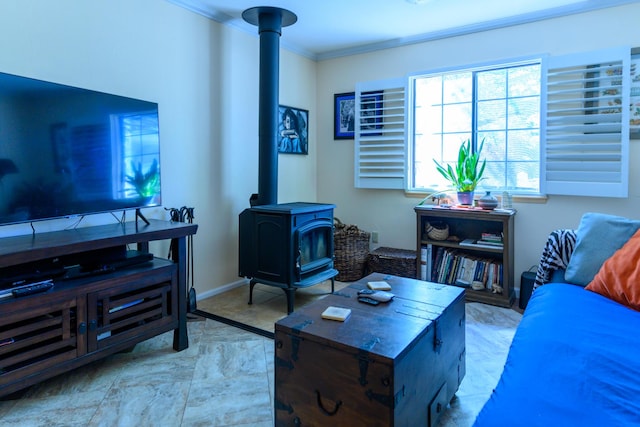 living room featuring ornamental molding and a wood stove