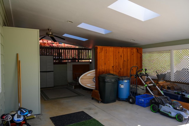 interior space featuring ceiling fan