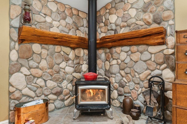 interior details featuring a wood stove