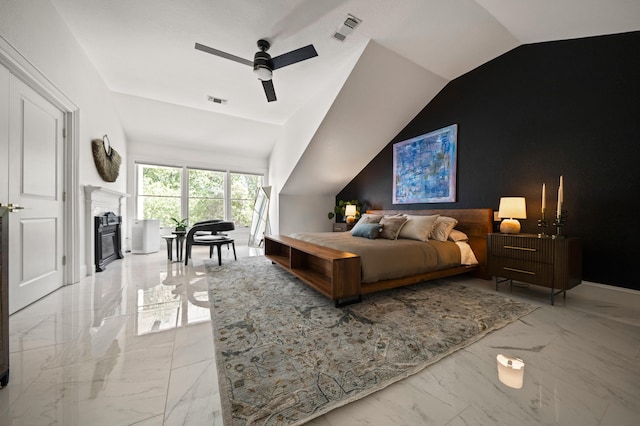 bedroom featuring ceiling fan and vaulted ceiling