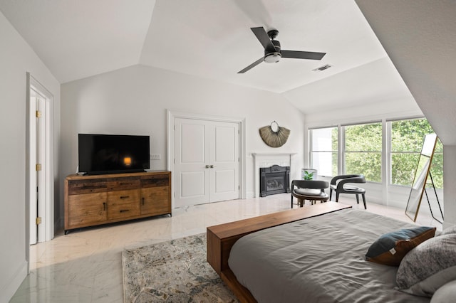 bedroom featuring lofted ceiling and ceiling fan