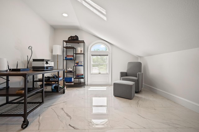 living area featuring lofted ceiling