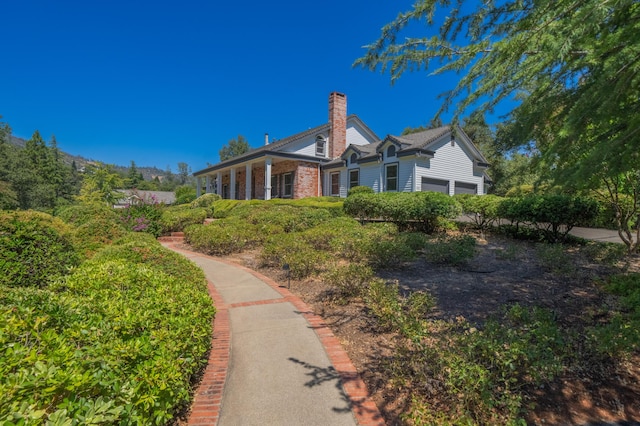 view of property exterior with a garage