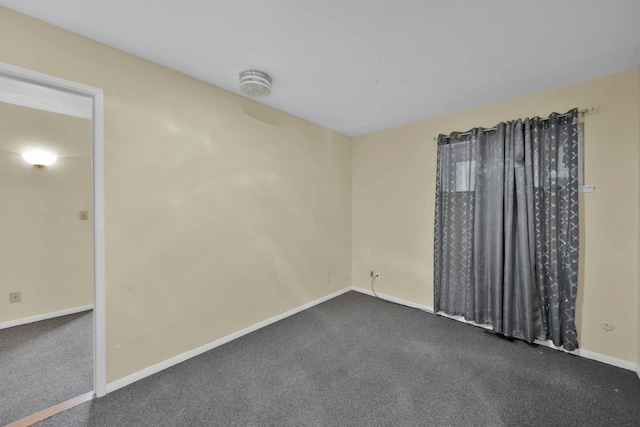 spare room with carpet floors