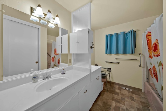 bathroom with vanity and shower / bath combination with curtain