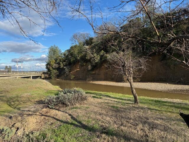 view of yard with a water view