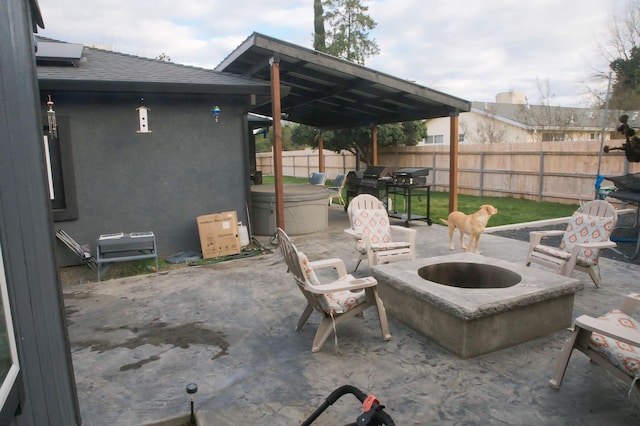 view of patio featuring a fire pit