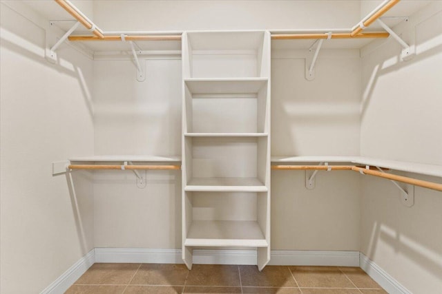 walk in closet featuring tile patterned floors