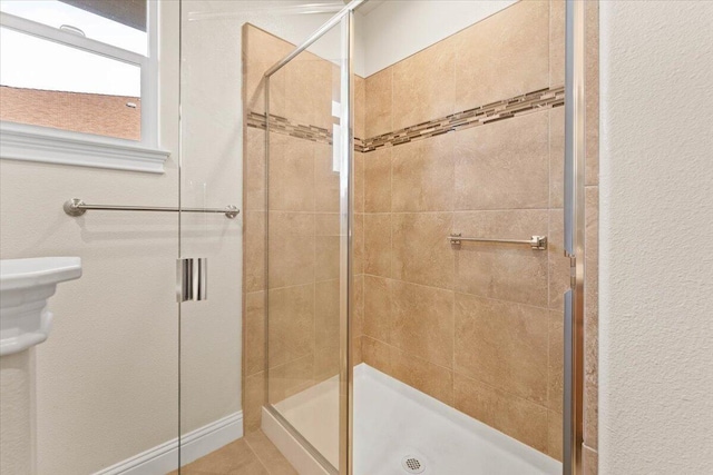 bathroom featuring walk in shower