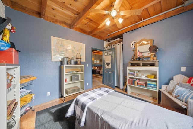 bedroom with wood ceiling, ceiling fan, light hardwood / wood-style flooring, and beamed ceiling