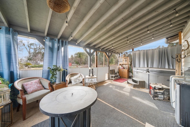 sunroom / solarium with vaulted ceiling