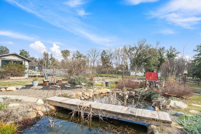 dock area with a water view