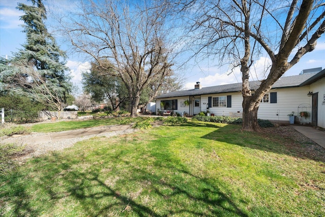 view of front of home with a front yard