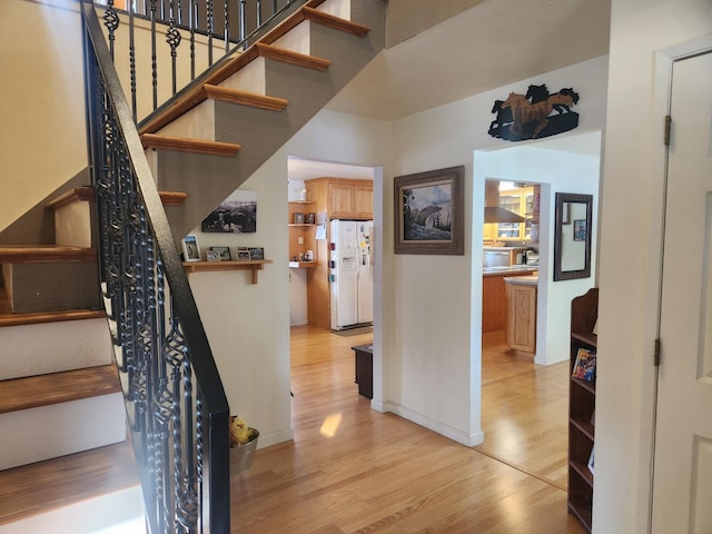 stairway with wood-type flooring