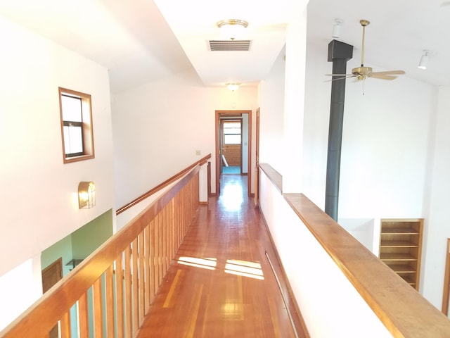 hall with light hardwood / wood-style floors