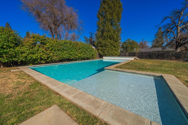7047 Tucker Ln, Redding, CA 96002 - view of swimming pool featuring a fenced backyard