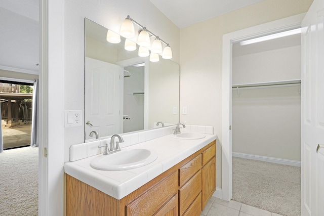 bathroom featuring vanity and tile patterned flooring