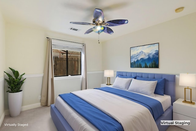 carpeted bedroom featuring ceiling fan