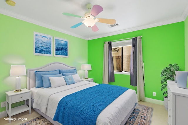 bedroom featuring crown molding and ceiling fan