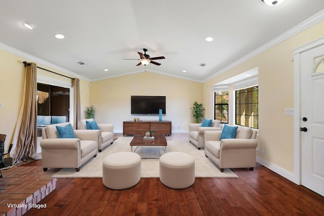 living room with hardwood / wood-style flooring, ceiling fan, ornamental molding, and vaulted ceiling