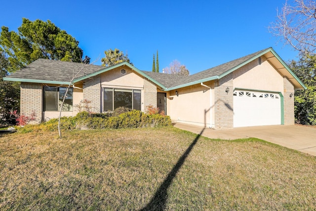 single story home featuring a garage, a front lawn, and brick siding