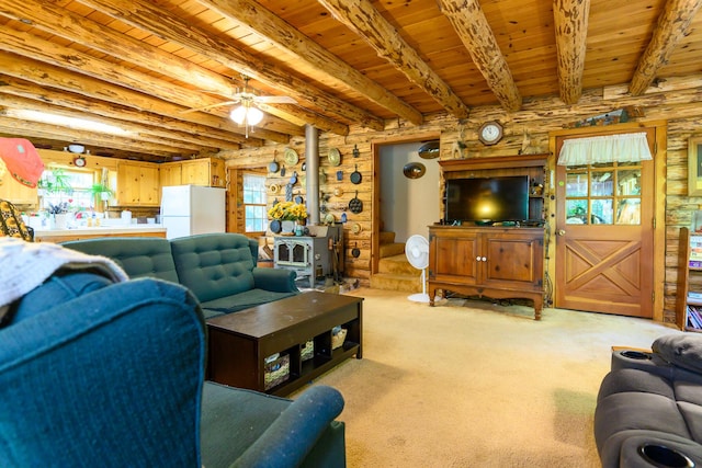 31 Lake Rd, Junction City, CA 96048 - living room featuring beam ceiling, wood ceiling, light carpet, and a wood stove