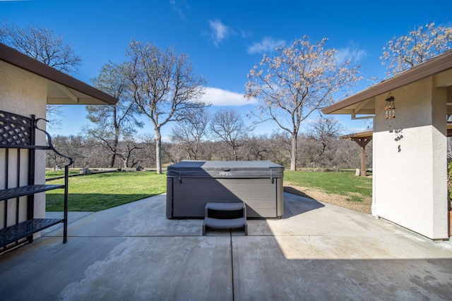 view of patio with a hot tub