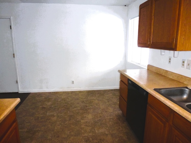 kitchen featuring dishwasher and sink