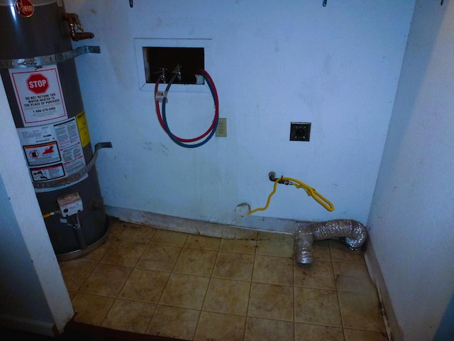 washroom featuring tile patterned floors, hookup for an electric dryer, hookup for a washing machine, and water heater