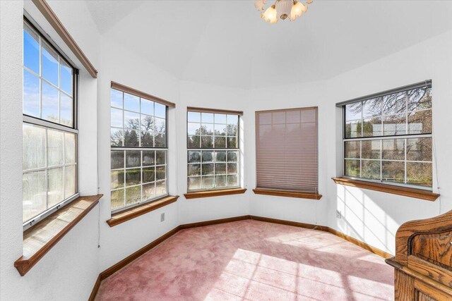 unfurnished sunroom with a healthy amount of sunlight