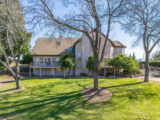 view of front of property with a front lawn