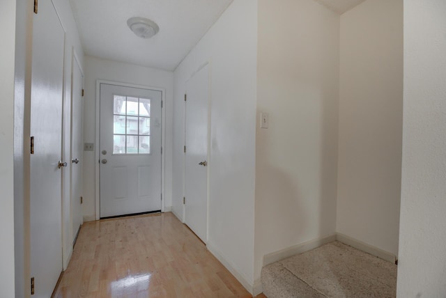 doorway to outside featuring light hardwood / wood-style floors