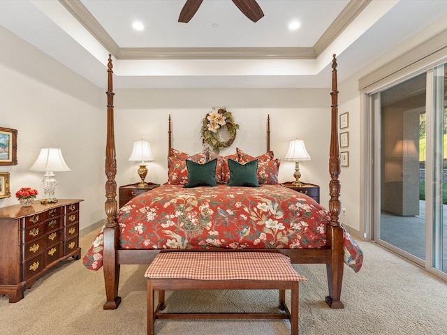 bedroom with ornamental molding, light colored carpet, access to exterior, ceiling fan, and a raised ceiling