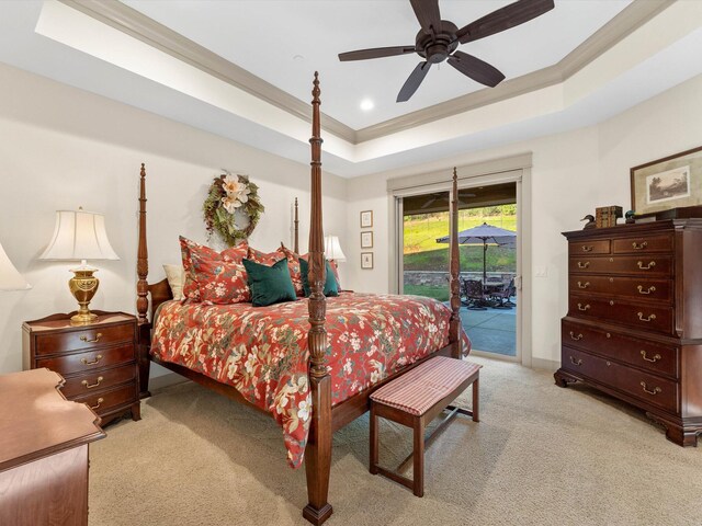 bedroom featuring ornamental molding, access to exterior, ceiling fan, a raised ceiling, and light carpet