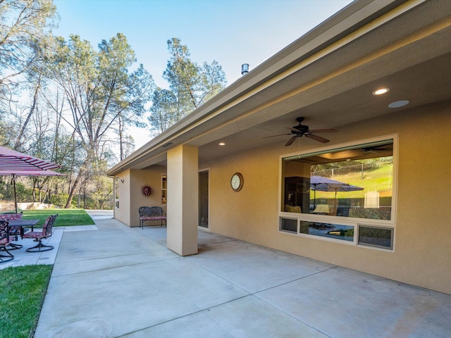 view of patio with ceiling fan