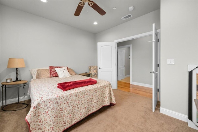 carpeted bedroom featuring ceiling fan