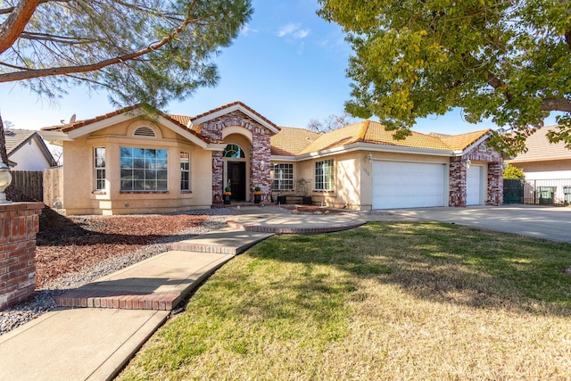 ranch-style house featuring a garage and a front lawn