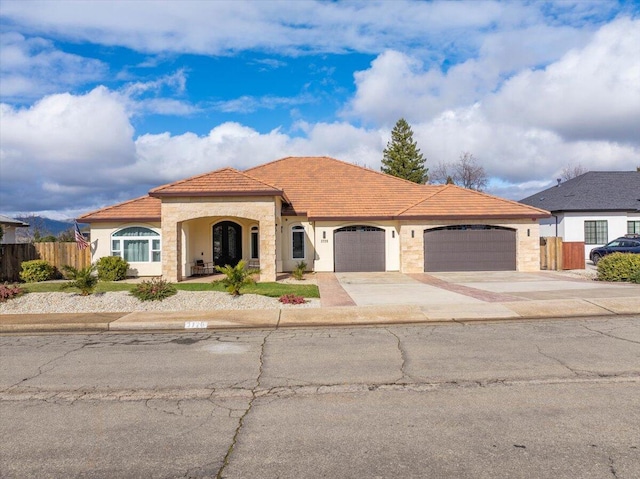 view of front of home with a garage