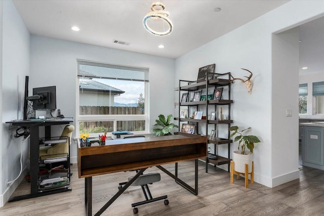 home office featuring light hardwood / wood-style flooring