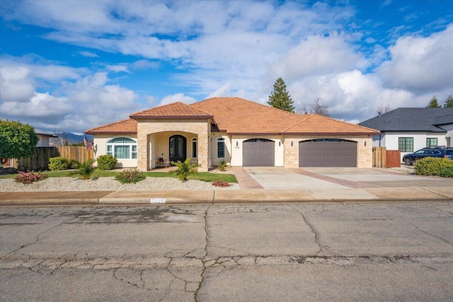 view of front of property with a garage