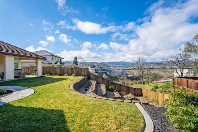 view of yard with a mountain view