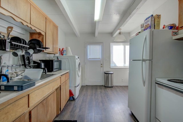 kitchen with stove, beam ceiling, dark hardwood / wood-style floors, washer / clothes dryer, and light brown cabinets