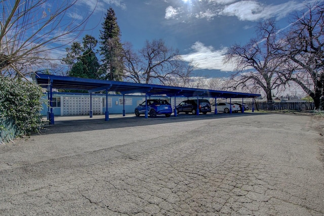 view of car parking with a carport