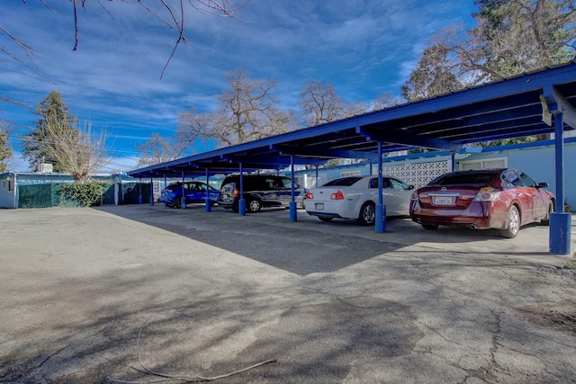 view of parking featuring a carport