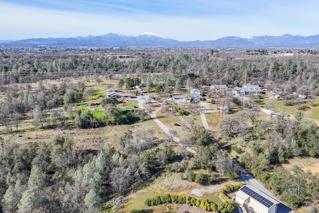 drone / aerial view featuring a mountain view