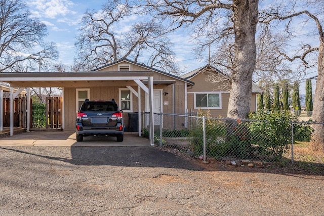 view of front of house featuring a carport