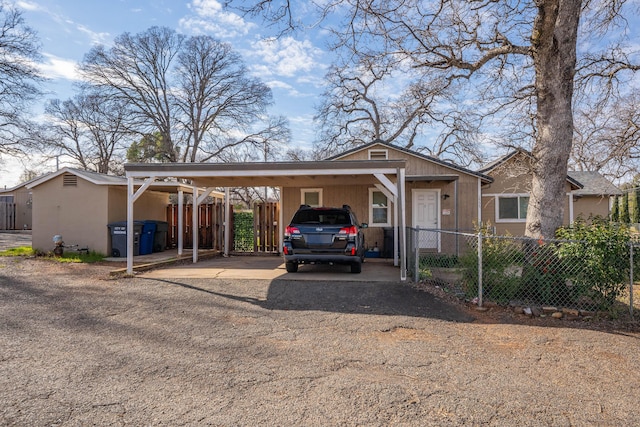 view of front of house with a carport